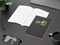 Notizbuch Tablet-Book Farbschnitt Naturkarton-Softcover schwarz, Papierformat/Lineatur DIN A5 / Winkelkaro, Farbschnitt/Logodruck orange/4farbig