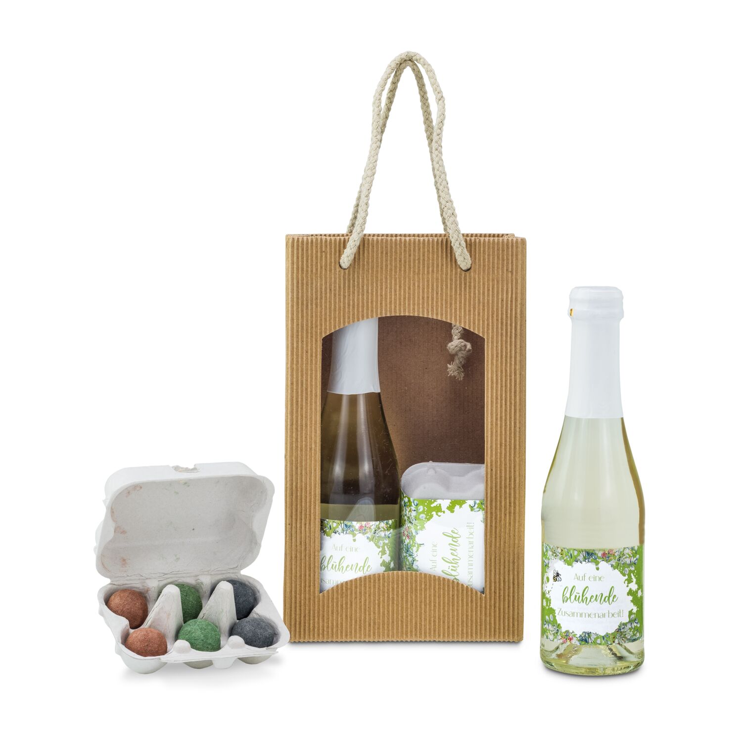 Ein leckerer Piccolo Secco (0,2 l) und eine Eierschachtel mit 6 bunten Blumenmurmeln. Einfach auf die Erde auswerfen & auf den Regen warten.