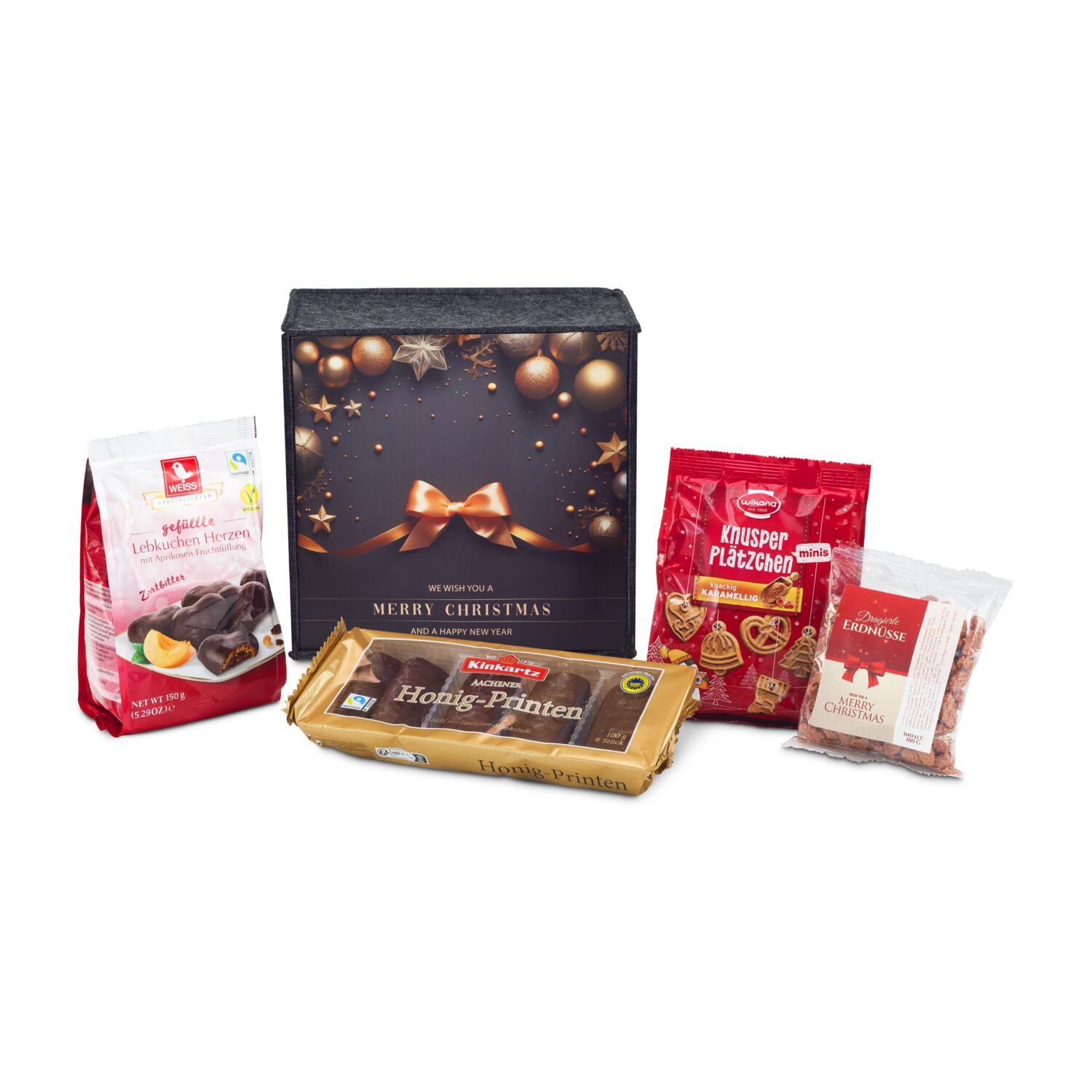 In diesem ROMINOX® Filzkorb befinden sich Honig-Saftprinten, Mini Plätzchen, Lebkuchen Herzen und dragierte Erdnüsse.