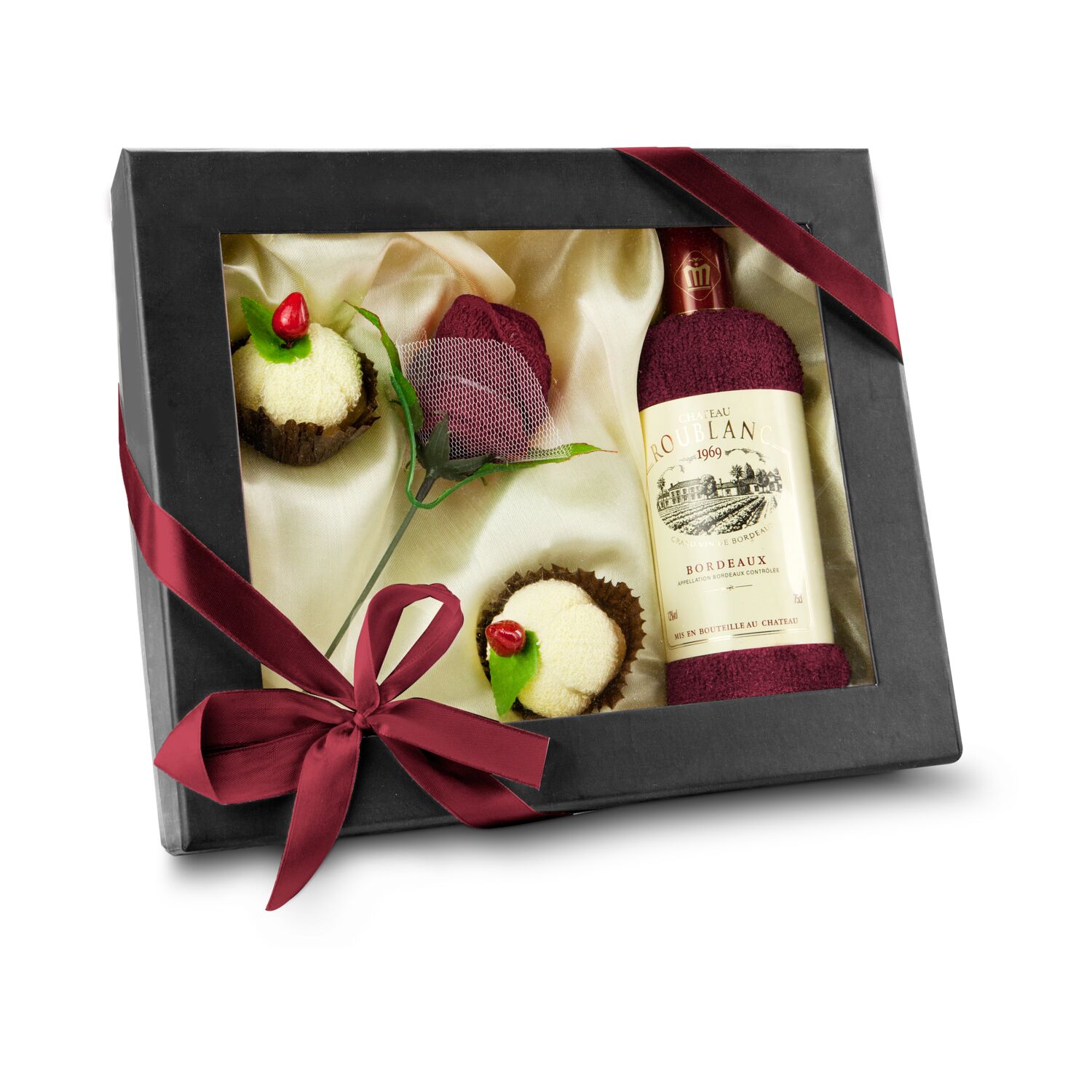 Gästetuch 33 x 72 cm gerollt als Weinflasche, 1 Gesichtstuch 20 x 20 cm geformt als Rose & 2 Gesichtstücher 20 x 20 cm gerollt als Pralinen